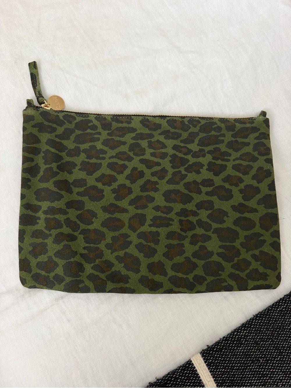 Ckare V suede flat clutch with loops for strap. Green Leopard Print. LIGHT STAIN